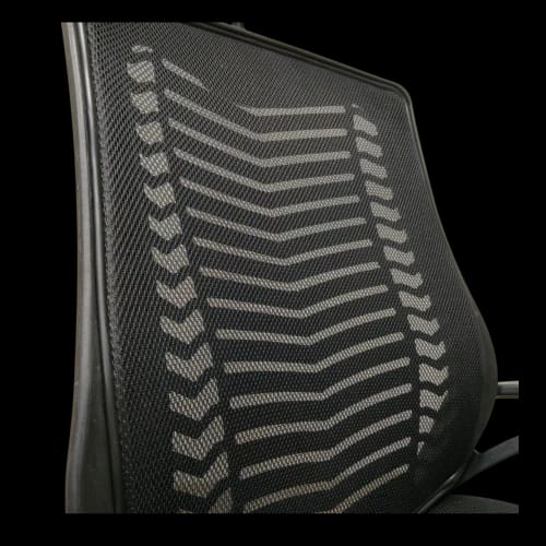 black chair mesh back close up 1