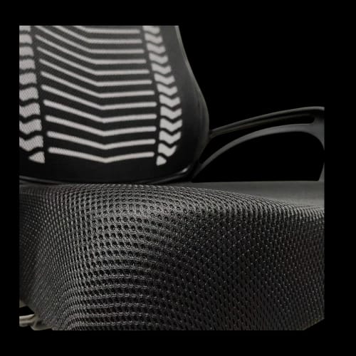 black chair mesh seat close up 1