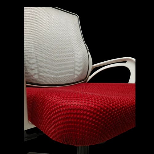 red mesh chair seat close up 1