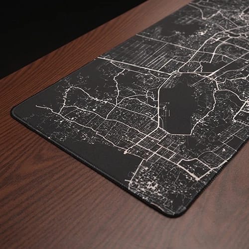 lines of dhaka black city map desk mat close up view 700 300