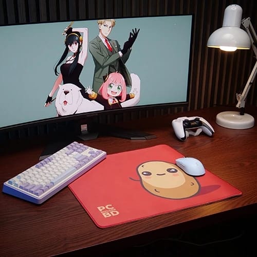 russet potato gaming desk setup with character mouse pad