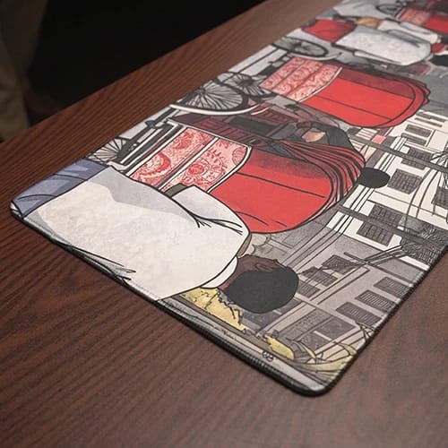 street vibes desk mat close up showing rickshaw artwork