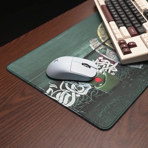 strength in unity green desk mat with mouse on printed surface 1